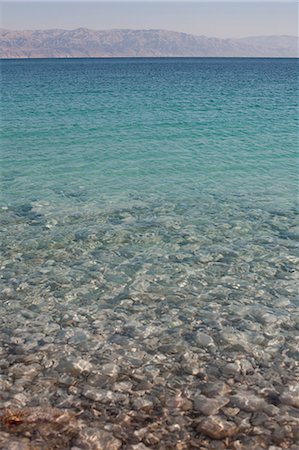 pebbles in the lake - Dead Sea under blue sky, Israel Stock Photo - Premium Royalty-Free, Code: 649-06717819