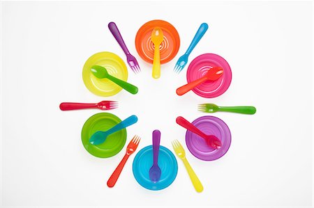 Colourful plastic plates, cups, bowls, spoons and forks Stock Photo - Premium Royalty-Free, Code: 649-06812404