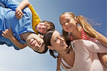 Portrait of family with two children from below Stock Photo - Premium Royalty-Free, Code: 649-06812440