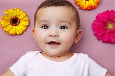 Baby girl with flowers Stock Photo - Premium Royalty-Free, Code: 649-06812541