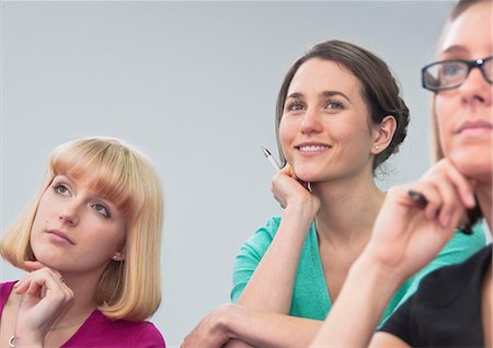 Women listening to presentation Stock Photo - Premium Royalty-Free, Code: 649-06829688