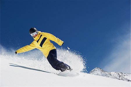 snowboard - Young woman snowboarding Stock Photo - Premium Royalty-Free, Code: 649-06844031