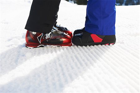 facing - Snowboarders with boots together Stock Photo - Premium Royalty-Free, Code: 649-06844055