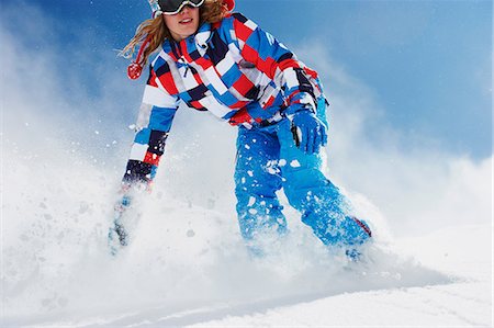 snowboarding - Female snowboarder in action Stock Photo - Premium Royalty-Free, Code: 649-06844061