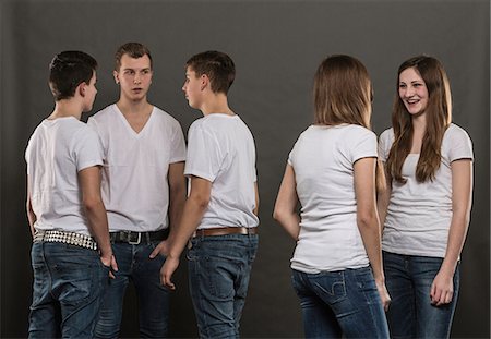 Five teenagers standing chatting Stock Photo - Premium Royalty-Free, Code: 649-06844563