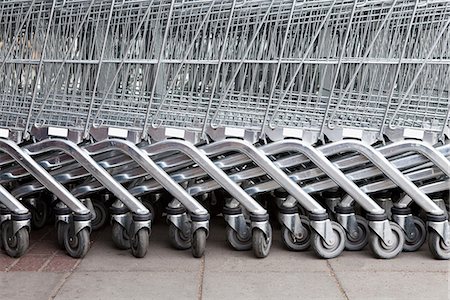 supermarket not people - Shopping trolleys in a row Stock Photo - Premium Royalty-Free, Code: 649-06844889