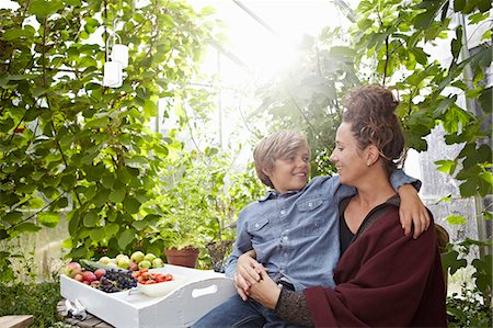 sunlight mature indoors - Mother and son sitting outdoors Stock Photo - Premium Royalty-Free, Code: 649-06943770