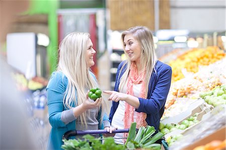 display fruits supermarkets - Two young women shopping in indoor market Stock Photo - Premium Royalty-Free, Code: 649-07064030