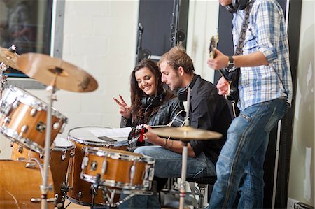 drummer - Young musicians looking at sheet music Stock Photo - Premium Royalty-Free, Code: 649-07064128