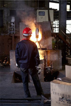 foundry worker - Working in cast iron foundry Stock Photo - Premium Royalty-Free, Code: 649-07064870