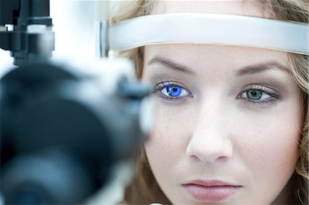 simsearch:649-07063763,k - Close up of young woman having eye examination Stock Photo - Premium Royalty-Free, Code: 649-07063777