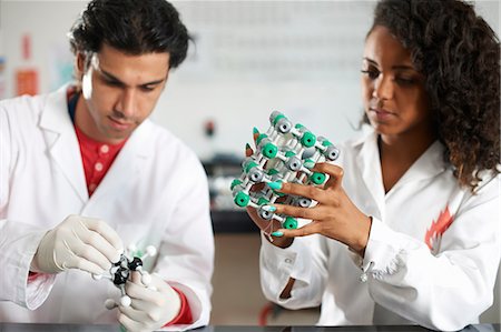 simsearch:649-07118442,k - College students holding molecular models Stock Photo - Premium Royalty-Free, Code: 649-07118451