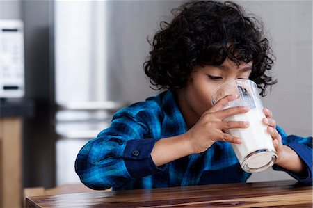 Boy drinking glass of milk Stock Photo - Premium Royalty-Free, Code: 649-07118946