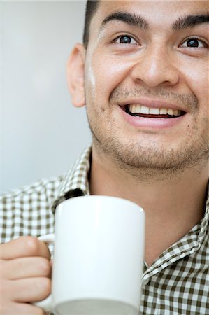 simsearch:649-07238896,k - Mid adult man with a coffee Stock Photo - Premium Royalty-Free, Code: 649-07238247