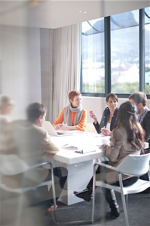 simsearch:649-07238396,k - Businesspeople meeting around conference table Stock Photo - Premium Royalty-Free, Code: 649-07238406