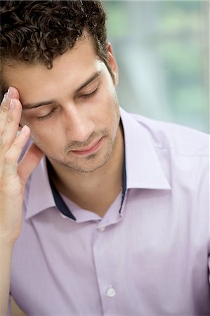 simsearch:649-07238896,k - Young man in deep thoughts Stock Photo - Premium Royalty-Free, Code: 649-07238914