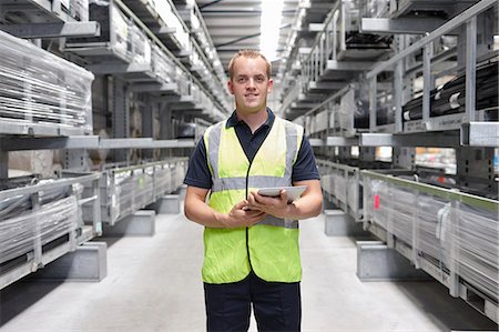 storage (industrial and commercial) - Portrait of worker in engineering warehouse Stock Photo - Premium Royalty-Free, Code: 649-07239373