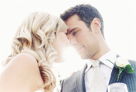 Newlywed couple touching noses Stock Photo - Premium Royalty-Free, Code: 649-07280327