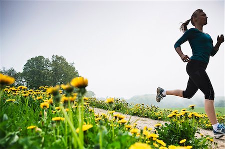 fitness in park - Mature woman running in countryside Stock Photo - Premium Royalty-Free, Code: 649-07280681