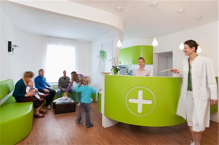 patients in waiting room - Medical waiting room and reception desk Stock Photo - Premium Royalty-Free, Code: 649-07280887
