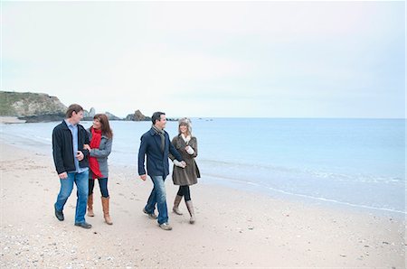 simsearch:649-07437331,k - Two adult couples walking on beach, Thurlestone, Devon, UK Stock Photo - Premium Royalty-Free, Code: 649-07436696