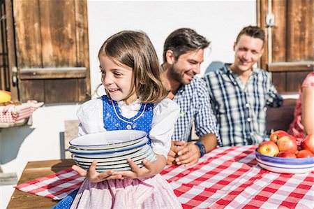 simsearch:649-07437620,k - Girl carrying breakfast plates outside chalet, Tyrol, Austria Stock Photo - Premium Royalty-Free, Code: 649-07437528