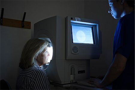 simsearch:649-07063763,k - Female patient having eye examination in hospital Stock Photo - Premium Royalty-Free, Code: 649-07437690