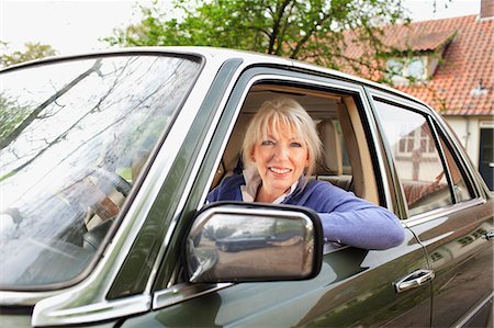 female driver - Portrait of mature woman in car Stock Photo - Premium Royalty-Free, Code: 649-07437921