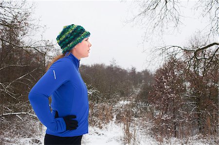 simsearch:649-07437947,k - Female runner taking a break in winter scene Stock Photo - Premium Royalty-Free, Code: 649-07437949