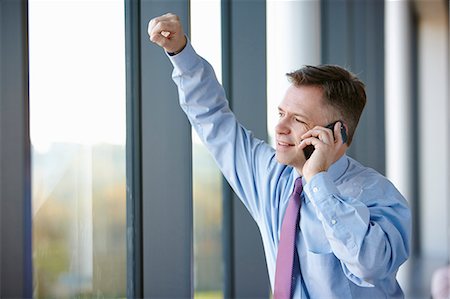 simsearch:649-07520071,k - Businessman on cell phone Stock Photo - Premium Royalty-Free, Code: 649-07520071