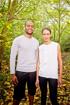 Couple standing in woods Stock Photo - Premium Royalty-Free, Code: 649-07520088