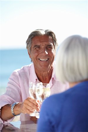 simsearch:649-07520161,k - Couple enjoying wine by seaside Stock Photo - Premium Royalty-Free, Code: 649-07520158