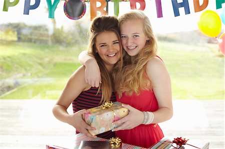 simsearch:649-07520254,k - Teenage girl and friend with birthday gift Stock Photo - Premium Royalty-Free, Code: 649-07520251