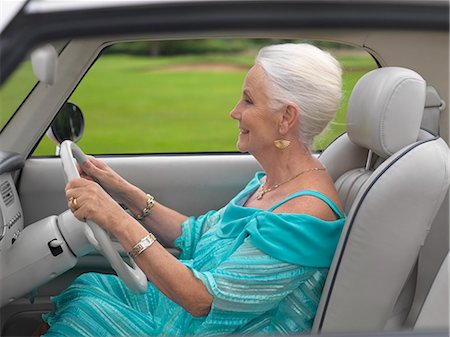 simsearch:649-07280823,k - Glamorous senior woman driving in car Stock Photo - Premium Royalty-Free, Code: 649-07520295