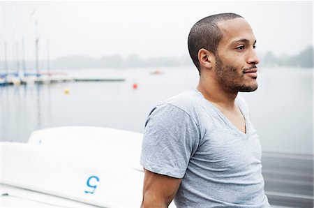 shaving (hygiene, male) - Portrait of young man by lake Stock Photo - Premium Royalty-Free, Code: 649-07520942