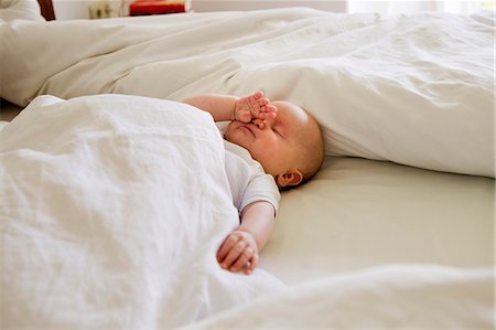 simsearch:649-07521015,k - Baby girl asleep on bed Stock Photo - Premium Royalty-Free, Code: 649-07521014