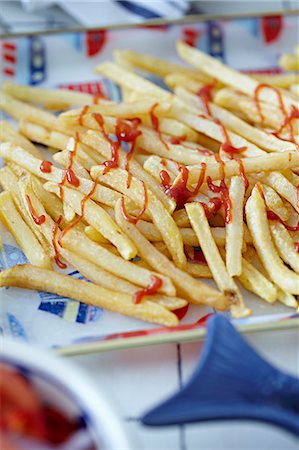 fries - French fries with tomato ketchup Stock Photo - Premium Royalty-Free, Code: 649-07647849