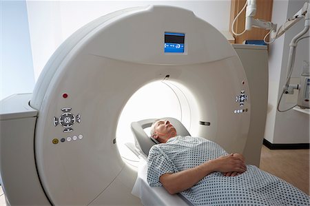 simsearch:649-07709952,k - Man going into CT scanner Stock Photo - Premium Royalty-Free, Code: 649-07709919