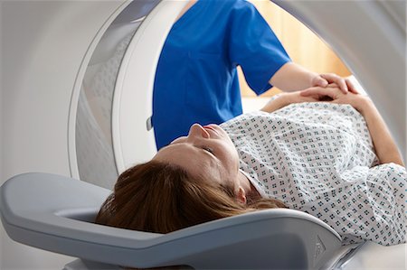 Woman in CT scanner Stock Photo - Premium Royalty-Free, Code: 649-07709930