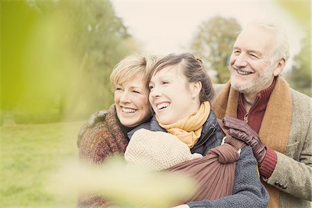 Three generation family smiling Stock Photo - Premium Royalty-Free, Code: 649-07710403
