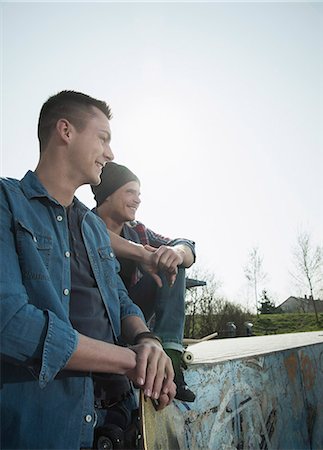 simsearch:649-07710443,k - Young men sitting together at skatepark Stock Photo - Premium Royalty-Free, Code: 649-07710447