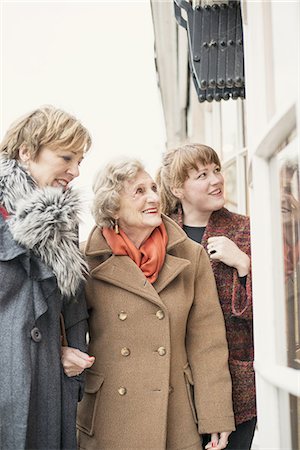 senior with daughter - Senior woman with daughter and granddaughter, looking in window Stock Photo - Premium Royalty-Free, Code: 649-07710599