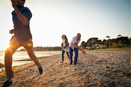 simsearch:649-07760822,k - Group of friends having fun on beach Stock Photo - Premium Royalty-Free, Code: 649-07760826