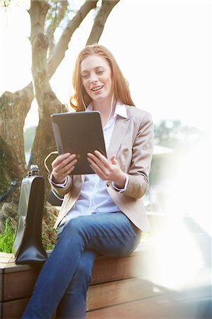 Business woman using digital tablet Stock Photo - Premium Royalty-Free, Code: 649-07804051