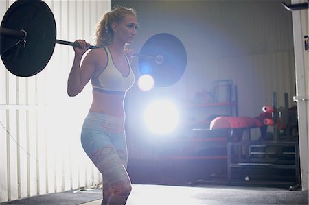 simsearch:693-08126938,k - Crossfitter lifting barbell in gym Stock Photo - Premium Royalty-Free, Code: 649-07804604