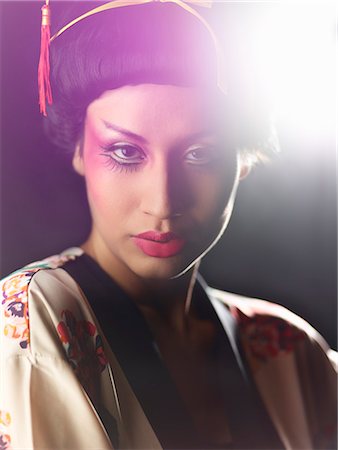 simsearch:649-07279678,k - Young woman wearing Oriental style make up Stock Photo - Premium Royalty-Free, Code: 649-07904911