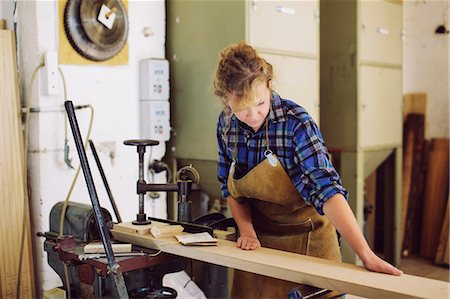 simsearch:649-07710266,k - Young craftswoman checking wood in pipe organ workshop Stock Photo - Premium Royalty-Free, Code: 649-07905020