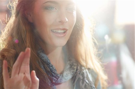 reflection - Young woman looking in shop window Stock Photo - Premium Royalty-Free, Code: 649-07905640