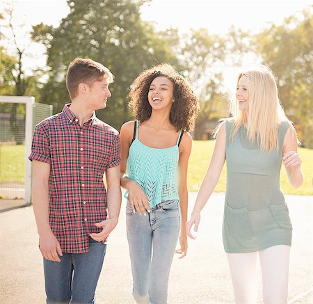 simsearch:649-07736862,k - Three young adult friends strolling in park Stock Photo - Premium Royalty-Free, Code: 649-07905660