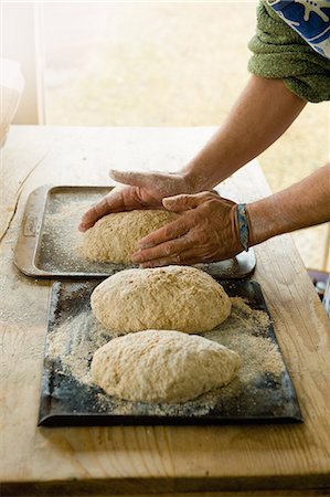 simsearch:649-06845217,k - Mature man making organic bread, focus on hands and bread Stock Photo - Premium Royalty-Free, Code: 649-08060131